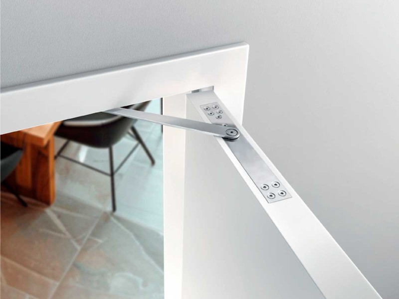 Доводчики для важких дверей: як вибрати надійну модель для тривалої експлуатації